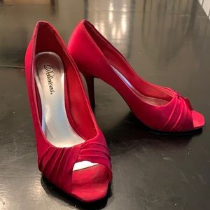 Red open toe pumps